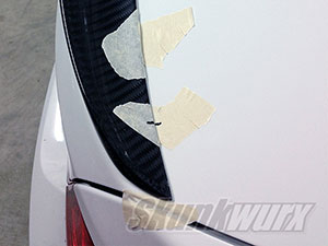 Position the spoiler